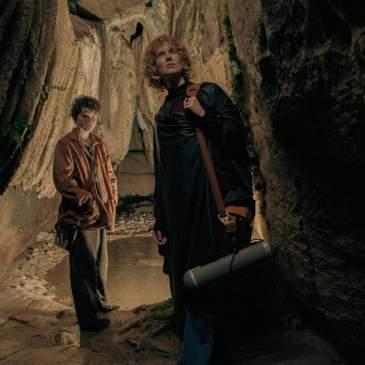 Woman and child in a cave